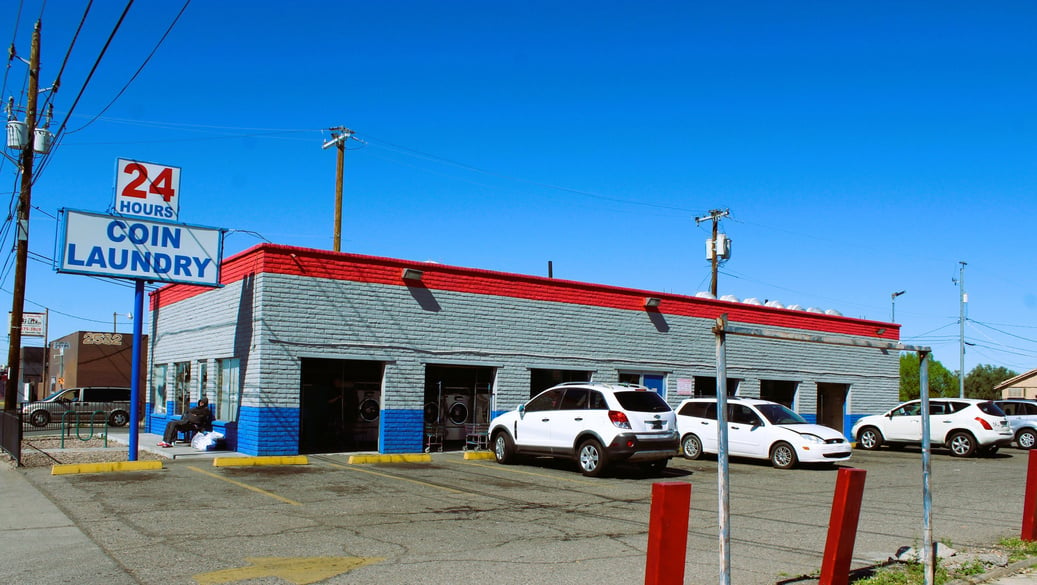  front of a coin laundry